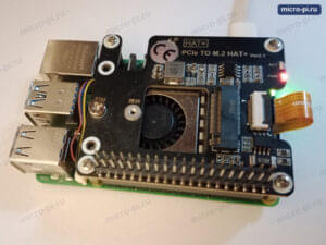 Raspberry Pi 5 с установленной платой PCIe to M.2 HAT+ с вентилятором, вид сверху: шлейф PCIe, разъём M.2 и подписи 2230 и 2242 у мест крепления винта